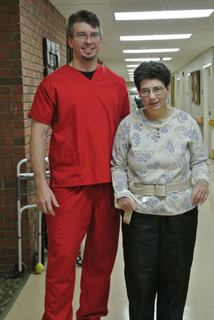 nurse and patient smiling at the camera
